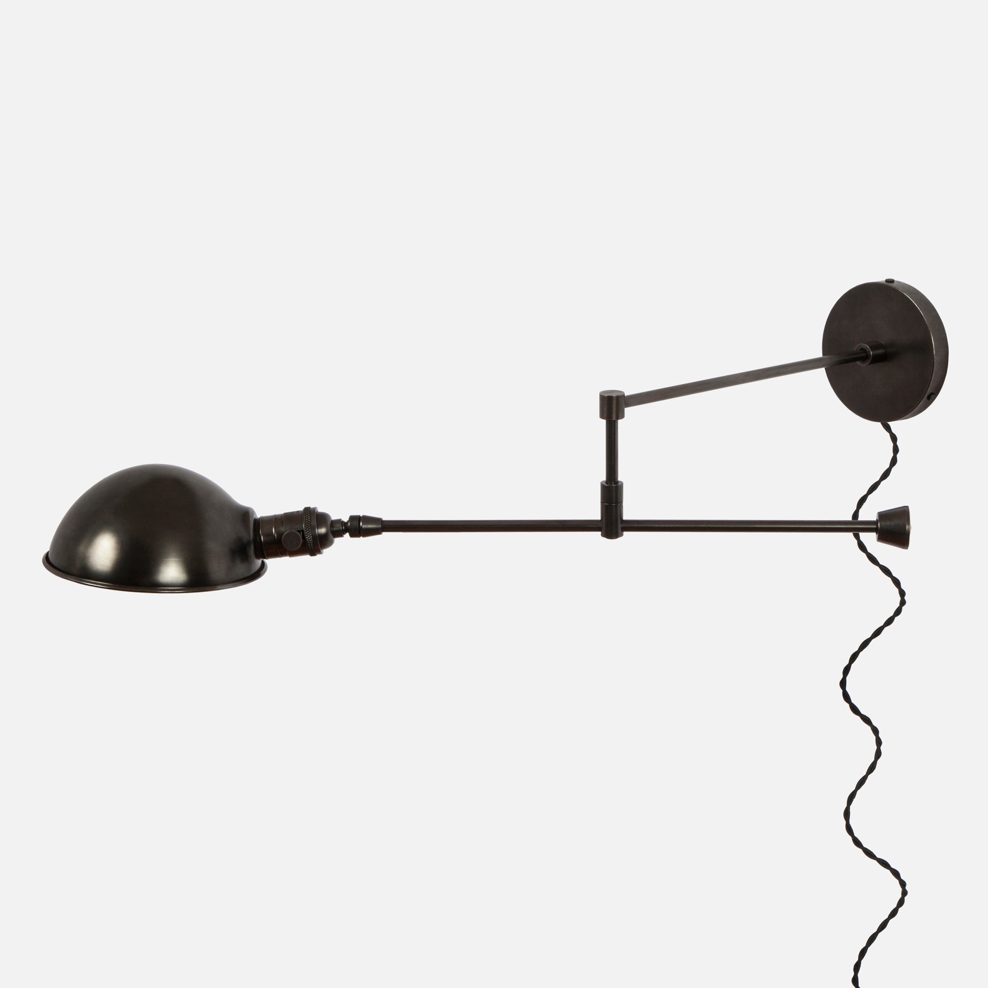 Swing arm sconce plug in top